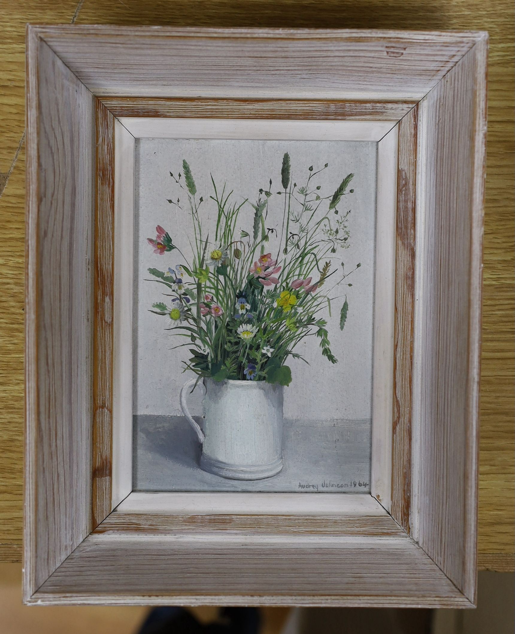 Audrey Johnson (b.1918), oil on panel, Still life of field flowers in a jug, signed and dated 1964, 16.5 x 11cm